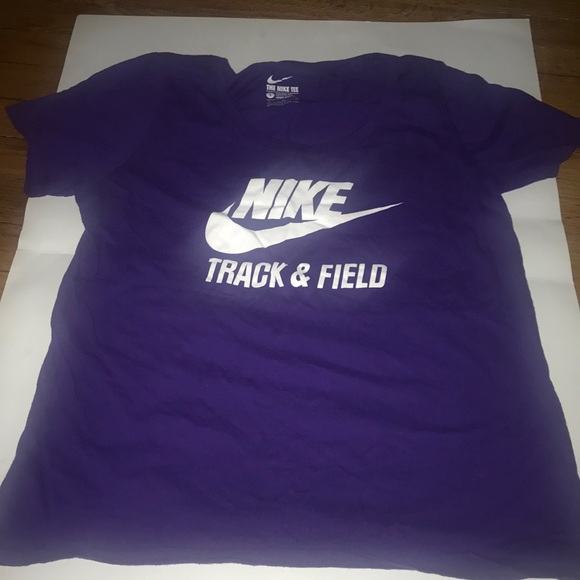 women purple nike shirt